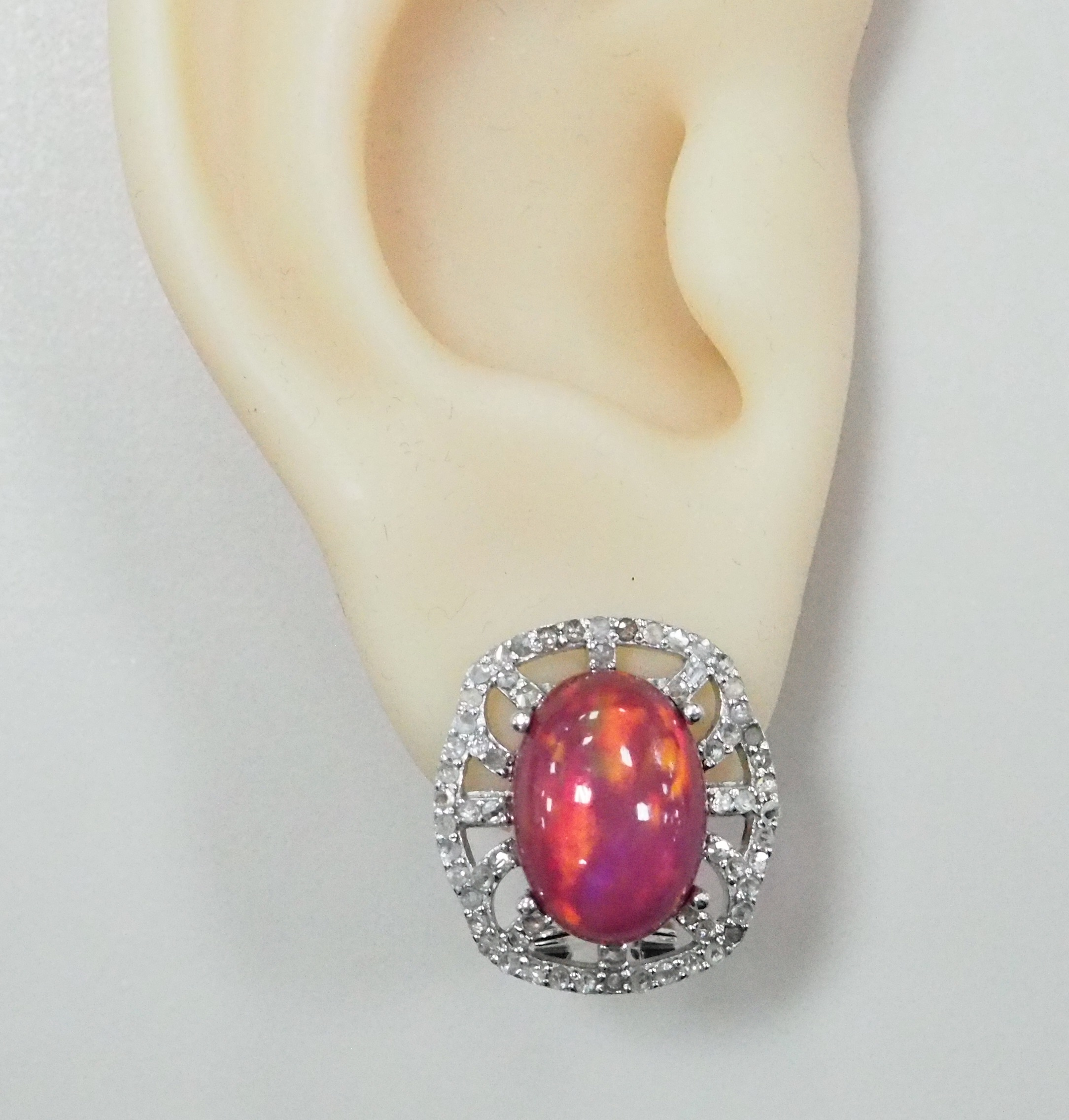Серебряные серьги 925 пробы; вставки 2 Опал роз. 8,01ct; 126 Бр.Кр-17 0,69ct 2/5;